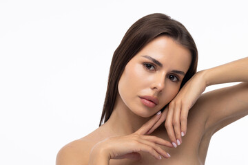 Portrait of young woman with perfect smooth skin isolated over white background.