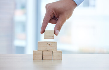 Healthcare, insurance and hand with blocks for security, future and investment in family. Surgery, pharmacy and doctor building a hospital foundation for safety, medical trust and nursing work