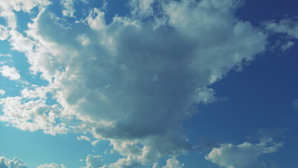 Soft White Cumulus Clouds Move In Blue Sky. Beautiful Nature. Natural Background.