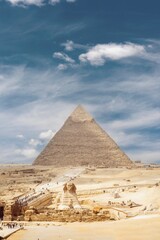 Ancient Egyptian pyramids and the Great Sphinx of Giza against the sky