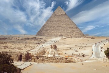 Ancient Egyptian pyramids and the Great Sphinx of Giza against the sky