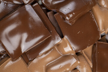 melted milk and bitter chocolate with cocoa powder