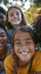 Fototapeta premium A group of children are smiling and posing for a picture