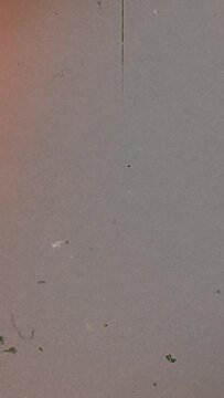 Vertical video - Retro Vhs screen film grain texture effect.