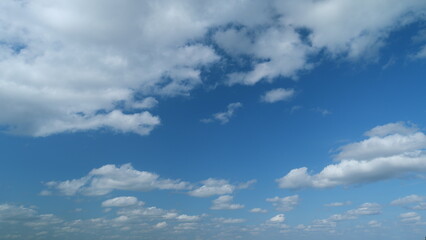 Beautiful white stratocumulus and cumulus cloud. Slowly move of white cumulus cloudscape. Timelapse.