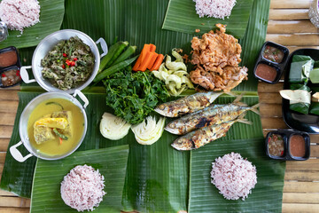 Nasi Iye Kapong; a taste of Pattani's local cuisine in southern of Thailand. This dish is deeply...