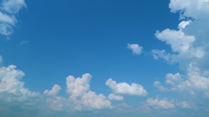 Blue sky with cumulonimbus rain cloud formations and sunlight. Foam bomb of exploding cloud....