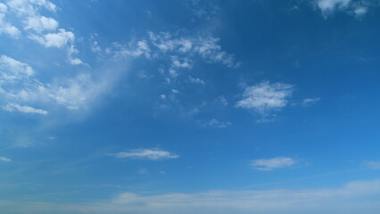 White clouds background. Blue sky with copyspace background. Timelapse.