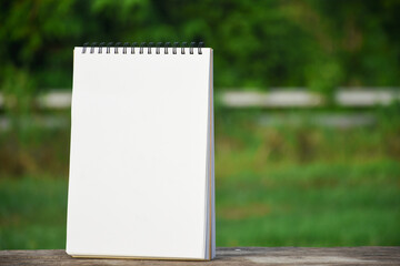 White drawing book on the table natural background