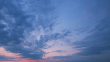 Evening sky at sunset in different shades. Beautiful romantic and colorful sky with brightly...