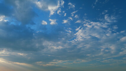 Cirrocumulus cloud in evening. Beautiful and relaxing clouds with a dark blue afternoon sky....