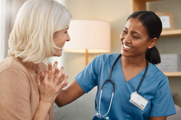 Happy, healthcare or medical with old woman and nurse on sofa in retirement home together. Assisted...