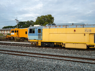 Fototapeta premium The maintenance train vehicle used for laying railway sleepers.