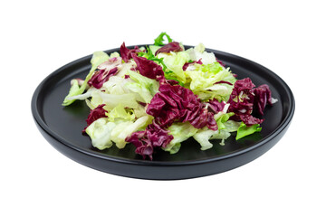 Leaf salad on black plate isolated on white