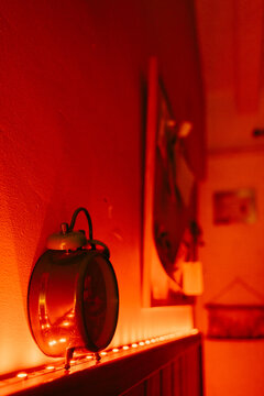 Clock in red light