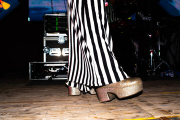 Detail of performer high heels on stage 