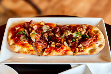 Breakfast Savory Flatbread Plated at Restaurant Table