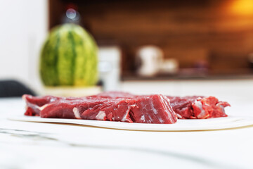 Raw Steaks. Sirloin Beef Steaks.Many Raw Striploin Steaks from Marbled Beef.