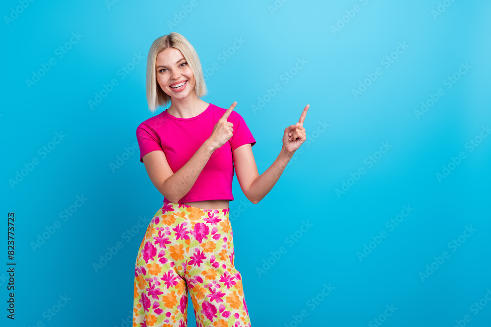 Poster photo portrait of lovely young lady smile point empty space dressed stylish pink clothes isolated on