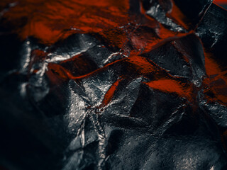 macro shot of a black and red foil