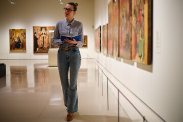 women in the museum looks at art exhibitions gallery