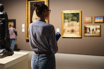 Woman Visiting Art Gallery Lifestyle Concept.