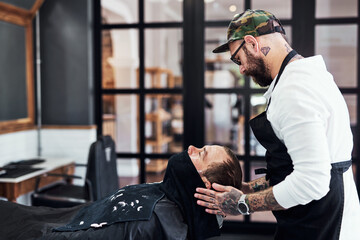 Beard, client and man in barbershop with facial, shave and tools for trendy hairstyle at small...