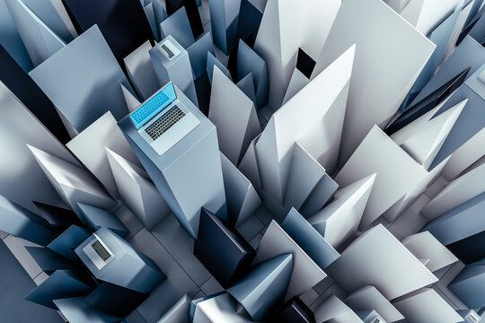 Laptop on Tower Surrounded by White and Blue Objects