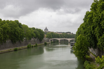 a bridge over the river tiber in rome leading to trestavere