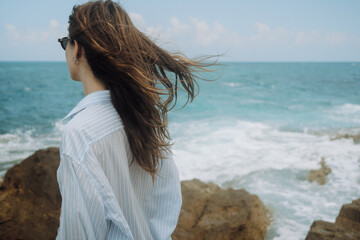Woman Standing on Beach by the Ocean/ Film vibes