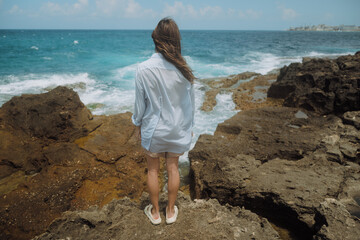 Woman Standing on Rock Near Ocean / Film vibes