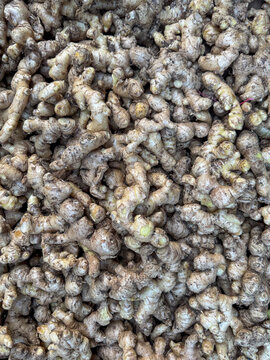 A pile of dried ginger root