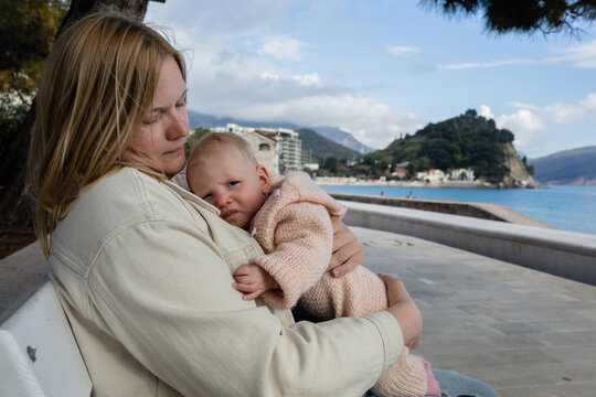 Crybaby in mother's arms