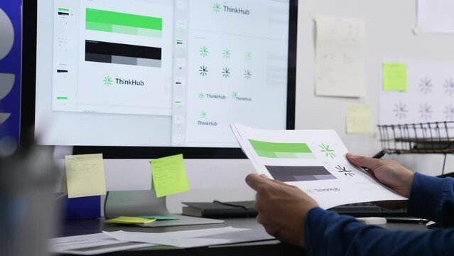 Young Asian Graphic designer working in office. Designing logo Artist Creative Designer Illustrator Graphic Skill Concept.