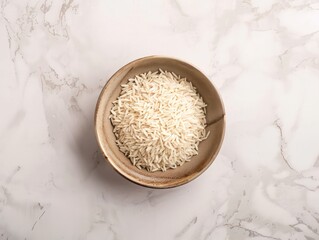 bowl full of basmati rice grains on a neutral background