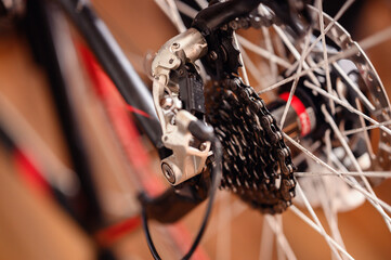 A close-up view of a bicycle's gear mechanism, highlighting the intricate parts and chains.