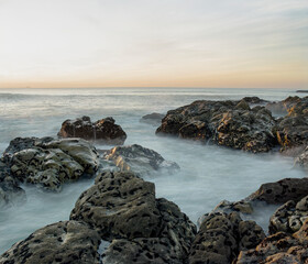 Rocky seascape at dusk