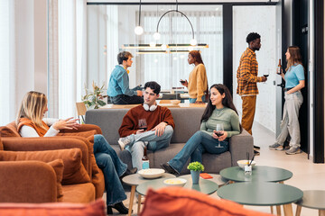 Casual office gathering with snacks and drinks