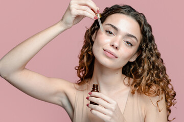 Woman with facial serum.