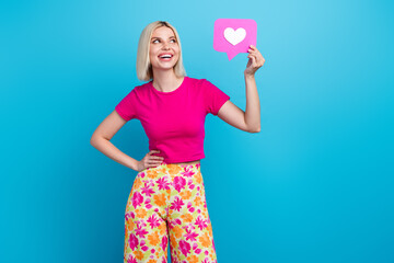 Photo portrait of attractive young woman hold look heart icon influencer dressed stylish pink...
