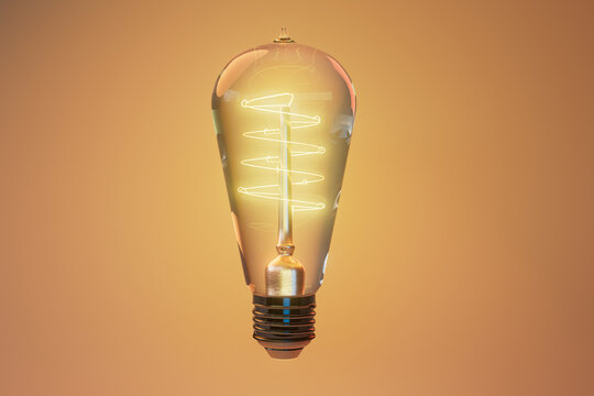 Illuminated Vintage Edison Light Bulb on Warm Background