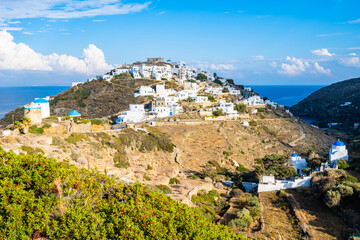 View of Kastro village on hill and sea in background, Sifnos island, Greece