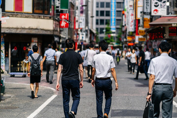 A weekday on a downtown street in a big city