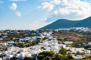 View of Apollonia village with typical white houses and mountains in background, Sifnos island,...