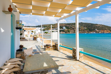 Terrace under shade of beach house in Platis Gialos village, Sifnos island, Greece