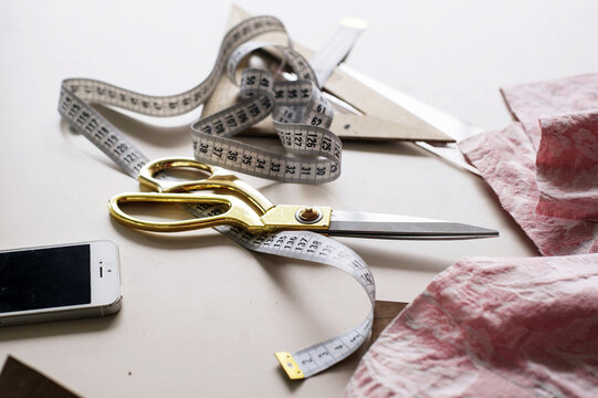 Tailoring Tools and Materials Scattered on a Table 