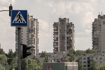 Pedestrian Crossing Sign and High Rise Tower Apartments