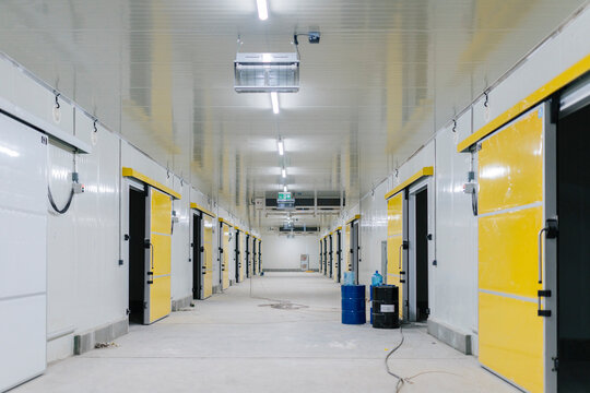 Illuminated empty corridor of modern new building