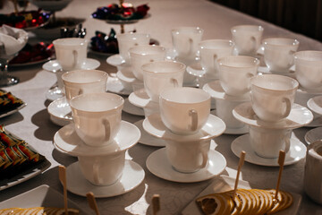 empty cups at a wedding on the tea table