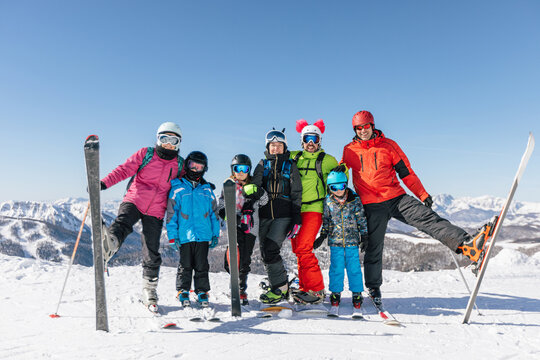 Portrait of group of family at skiing trip